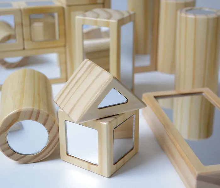 Mirror blocks showing six geometric shapes with reflective surfaces