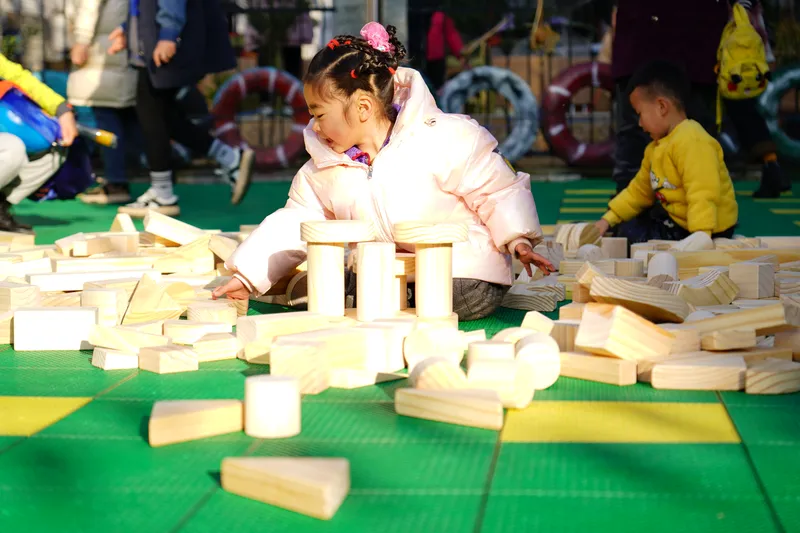 outdoor games for preschoolers constructing with educational wooden building blocks
