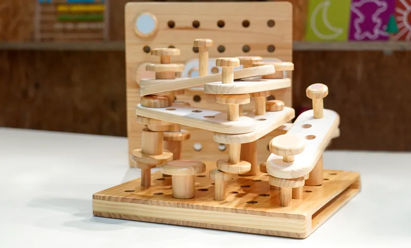 Colorful mushroom pegs showing three different sizes and matching base plates