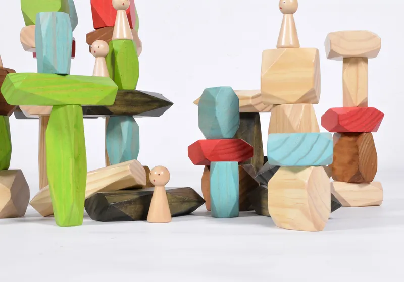 Balance challenges and creative architecture projects with stacking stones