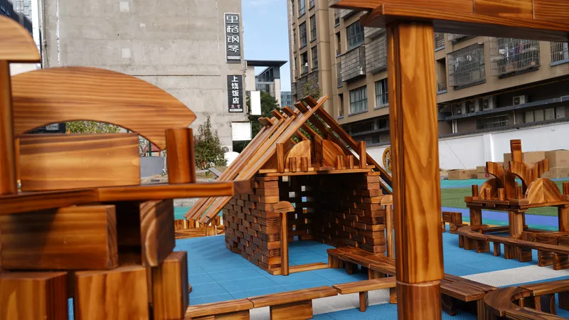 Charred wood building blocks with groove board systems