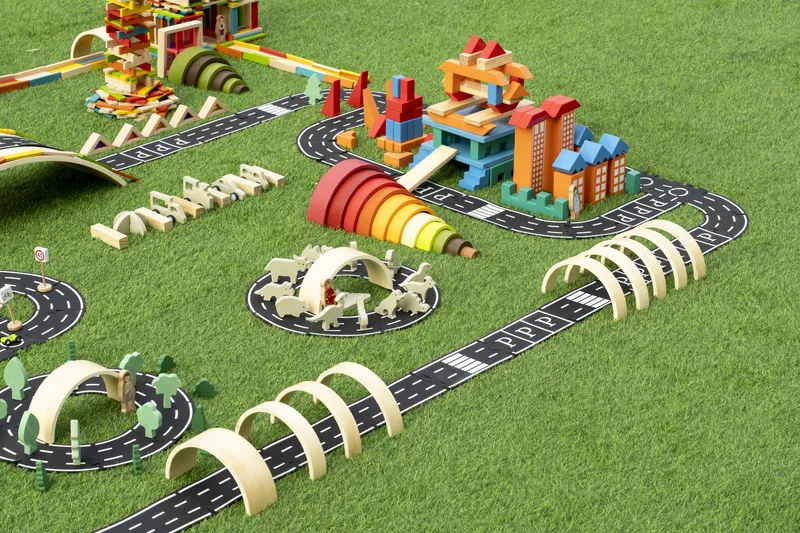 Railway expansion set with PVC road elements and wooden buildings