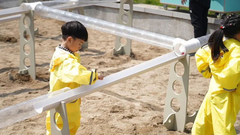 Water wheel and piping system detailed view