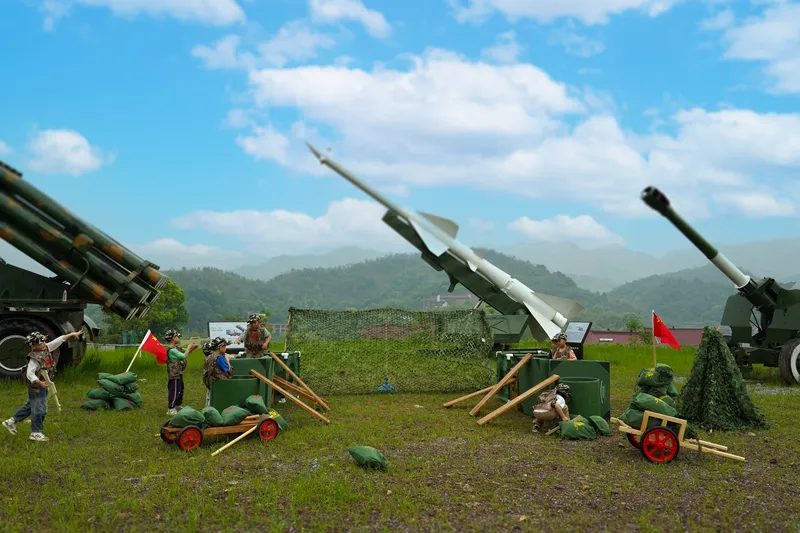 Children using tactical training equipment for leadership development