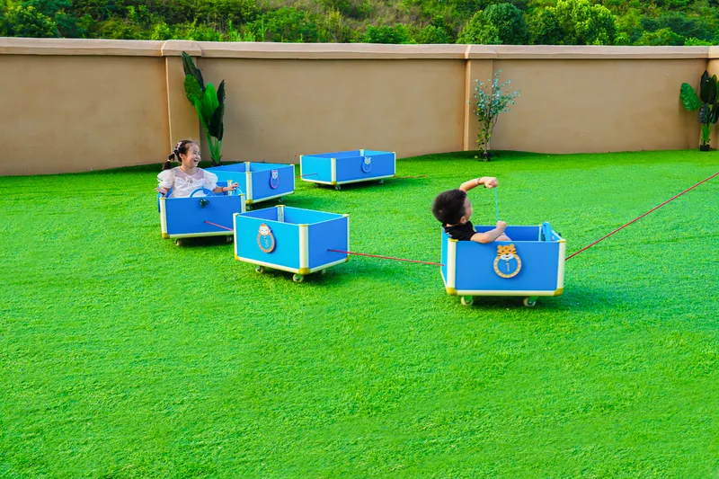 Children building modular train systems with engineering skills