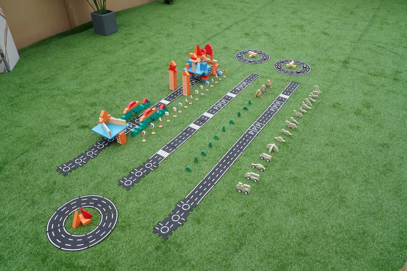 Track building set with vehicle collections