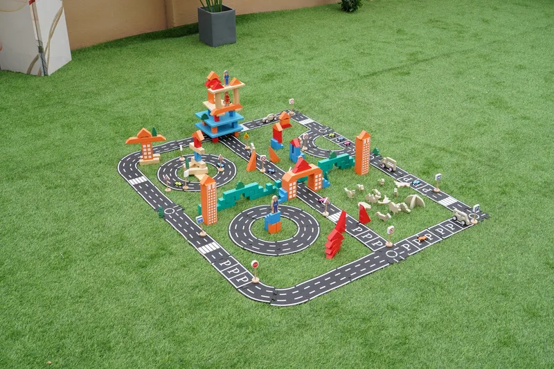 Dinosaur figures and architectural elements