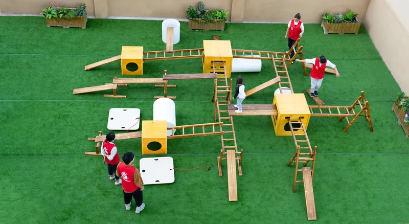 outdoor games for preschoolers being facilitated by trained early childhood educator