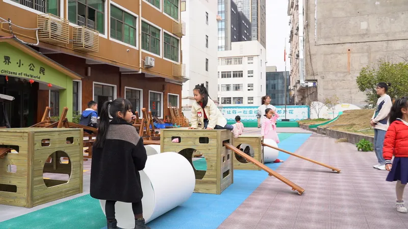 Anji play teacher documenting children's true play for later reflection session