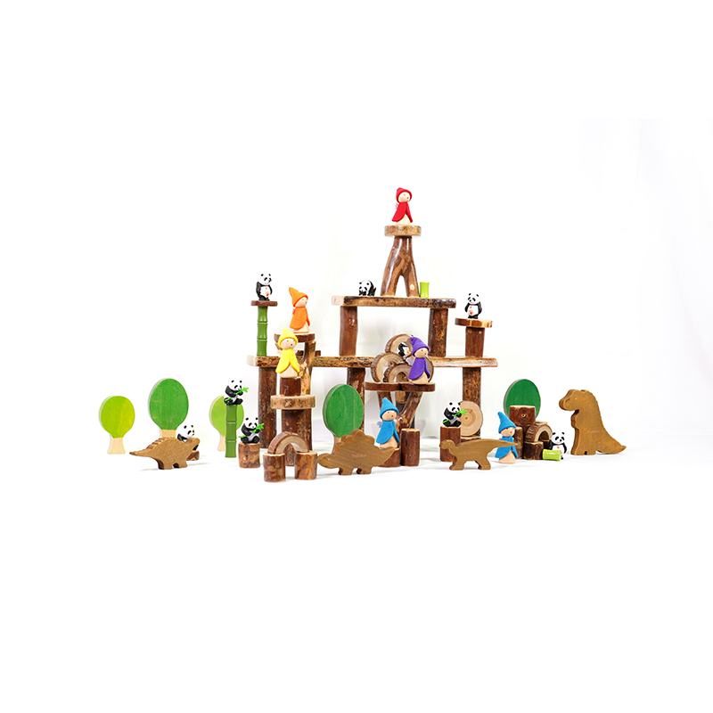 Imaginative play scenarios with dinosaur figures and building elements