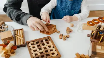 Pre-K classroom with Pre K Activities including building blocks, puzzles, and alphabet toys
