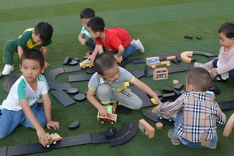 Children using classroom toys for preschoolers during free play time