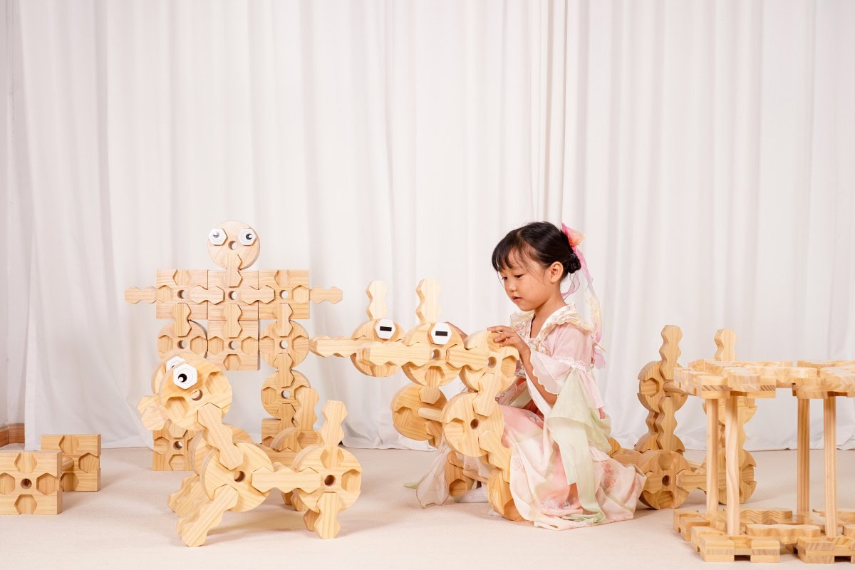 wooden educational blocks inspected before classroom use