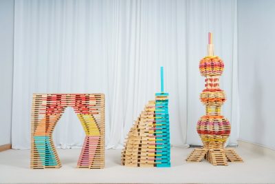 Large architectural structures built with 2000 natural and colorful pinewood planks