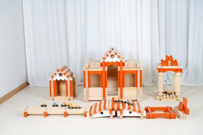221-piece wooden interlocking construction set built as houses bridges and animal train tracks