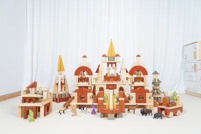 412-piece fantasy castle wooden building blocks arranged as towers palaces bridges and courtyards