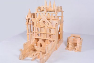 Large architectural construction built with 528-piece New Zealand pine unit blocks