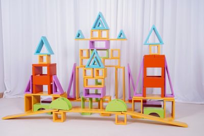 Thirteen shapes included in the colorful large hollow wooden block system