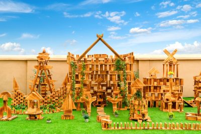 1633-piece large outdoor wooden building blocks arranged into an expansive preschool construction environment