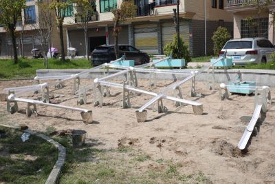 220-piece outdoor sand and water play system with four blue plywood water wheels