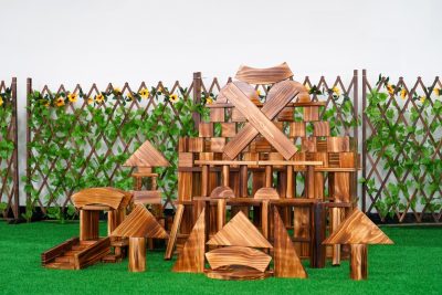 260-piece outdoor wooden building block set assembled into large carbonized wooden architectural structures