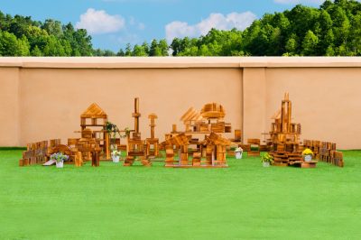 430-piece outdoor wooden building block set arranged into a large carbonized wooden construction environment
