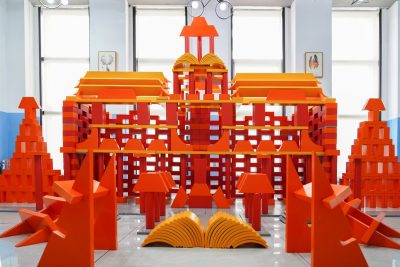 888 piece large outdoor architectural building set assembled into a colorful landmark structure