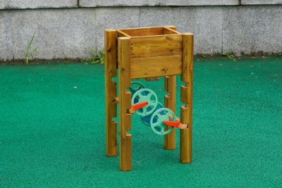 outdoor wooden sand flow station with rotating rollers for preschool sand play