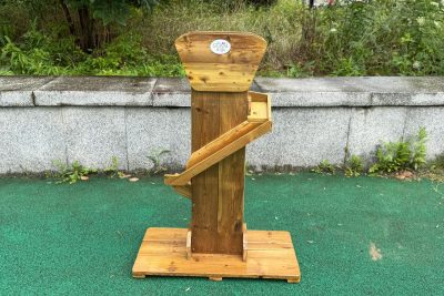 outdoor wooden spiral sand play station for preschool gravity and sand flow exploration