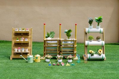 13-piece kids vertical gardening set with planters watering cans spray bottles and garden tools