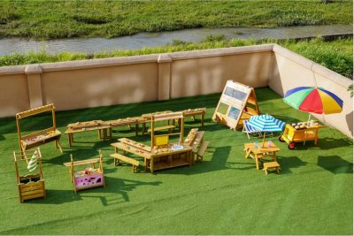 preschool outdoor dramatic play set with kitchen tables benches campfire play tent food cart and role play accessories