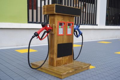 wooden pretend gas pump for kids with dual nozzle styling for preschool traffic role play