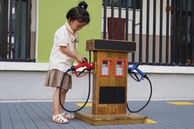 pretend gas station for preschool balance bike track and outdoor transportation play
