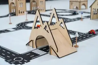 Close-up of slot-assembled plywood town building panels and window details